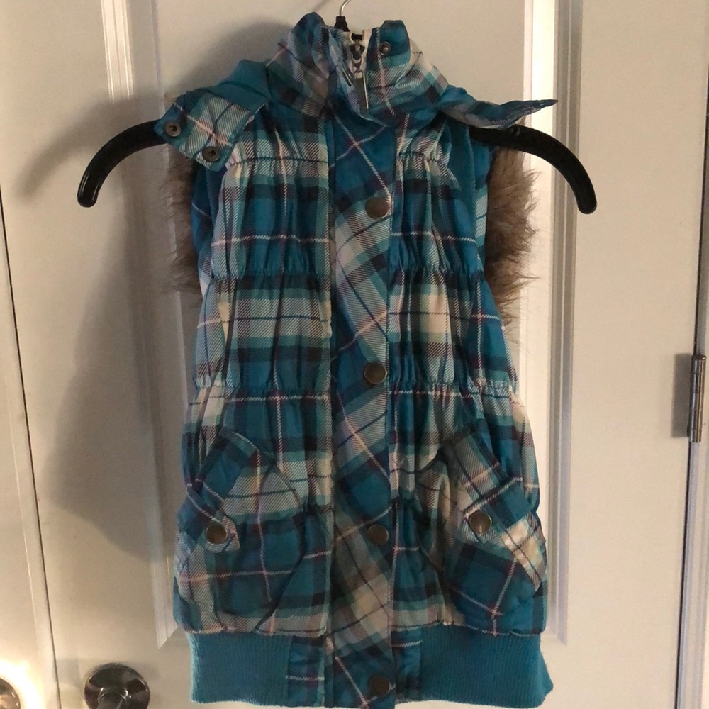 Blue checkered puffer vest with faux fur hood